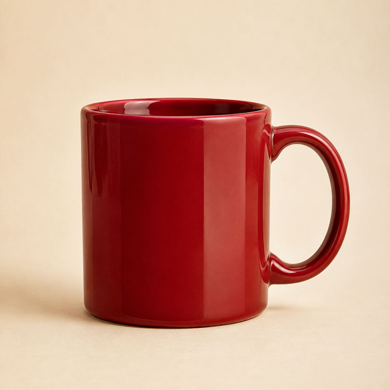 Glossy red ceramic coffee mug